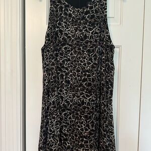 Flirty asymmetrical hem animal print tunic - Karen Kane